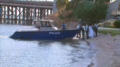 Locals have been warned to steer clear of the area as emergency crews respond to a suspected shark attack in the Swan River at North Fremantle.