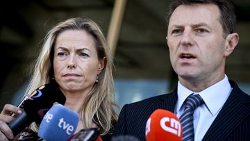 Kate and Gerry McCann talk to the press after delivering statements at the court house in their case against Portuguese police officer Goncalo Amaral, in Lisbon on July 8, 2014.