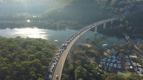 A dozen bottlenecks across greater Sydney are being targeted for improvements to shave valuable minutes off the peak-time commute.