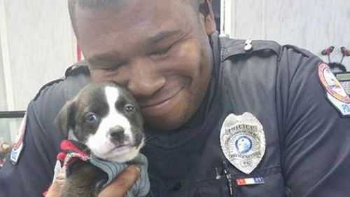 US police officer adopts abandoned pup encountered on a job