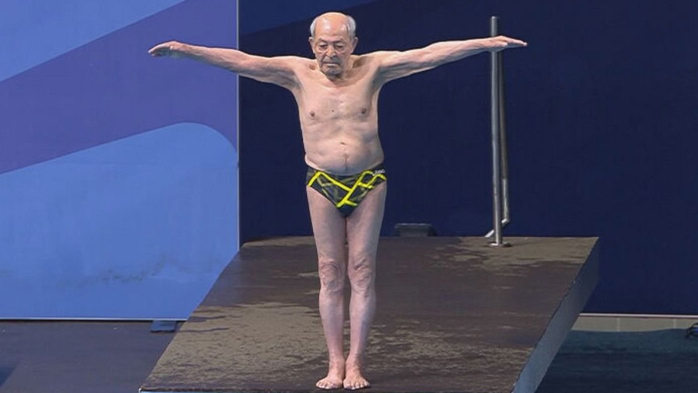 Crowd in awe as 100-year-old man dives at World Aquatics Championships