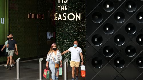 Shoppers in Sydney on Christmas Eve