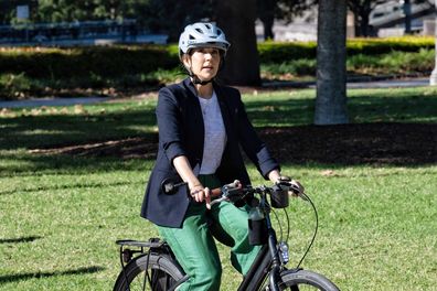 Princess Mary of Denmark , escorted by City of Sydney staff and security, tours Hyde Park first on foot then bike.  Photo Nick Moir 27 April 2023
