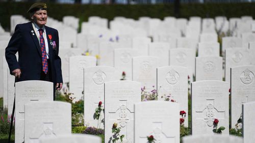 Normandy Veteran John Prior views graves ahead of the Royal British Legion Service of Remembrance at the Commonwealth War Graves Cemetery at Bayeux, France.