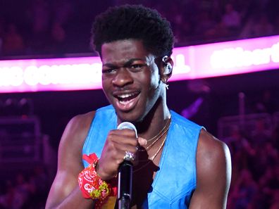 Lil Nas X, performs, on stage, singing, iHeartRadio Music Festival