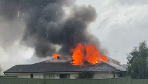 A house has been destroyed after a suspected lightning strike in Sydney.