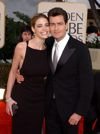 Denise Richards and Charlie Sheen arrive for the Golden Globe Awards at the Beverly Hilton Hotel in Beverly Hills, California January 20, 2002. 