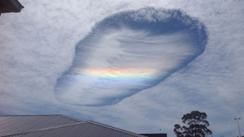 The cloud is known as a fallstreak hole. (Peter Wilcox)