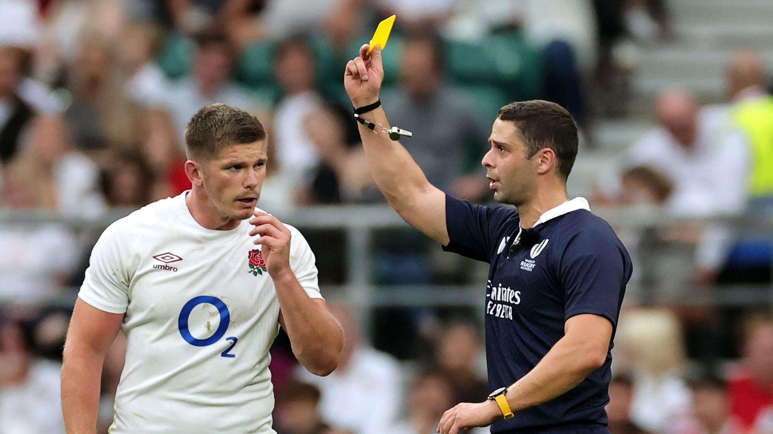 Nika Amashukeli, the referee, shows Owen Farrell a yellow card which was later upgraded to red after a TMO review.