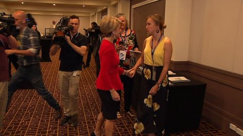 Julie Bishop shakes hands with student Belle Dare.