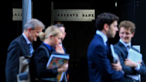 People walk past the Reserve Bank of Australia in Martin Place, Sydney.