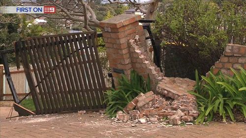 The gates of Trevor Fing's property were ripped off by police who raided his house in Newcastle last week. (9NEWS)