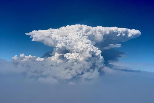 A pyrocumulus cloud, also known as a fire cloud, is seen over the Bootleg Fire in southern Oregon on Wednesday, July 14, 2021. Smoke and heat from a massive wildfire in southeastern Oregon are creating "fire clouds" over the blaze. (Bootleg Fire Incident Command via AP) 