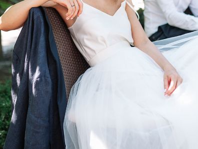 Bride sitting angry at wedding