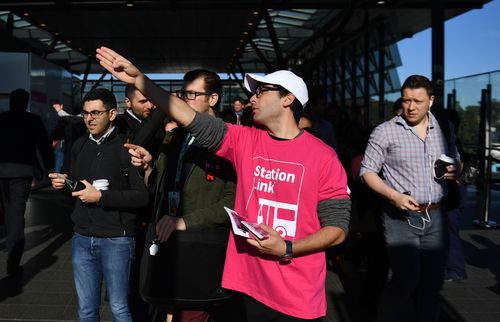 Staff in pink shirts directed frustrated commuters to 'Station Link' buses.