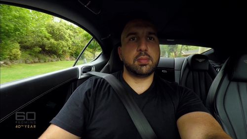 Sam Karagoizis drives his Bentley. (60 Minutes)