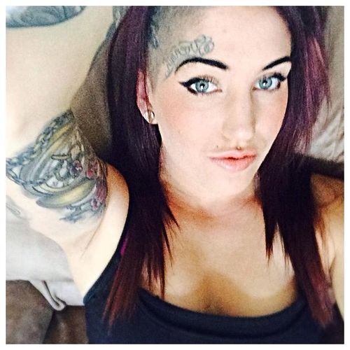 Simpson has the word 'strength' tattooed on her face. (Facebook)