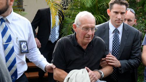 Former Police officer Roger Rogerson is taken into custody by NSW Police at his home in Padstow, Sydney, Tuesday, May 27, 2014. (AAP)