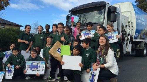 Arda was surrounded by his Grade 5 class mates from Epping Views Primary SChool for the truck's visit. (Supplied)