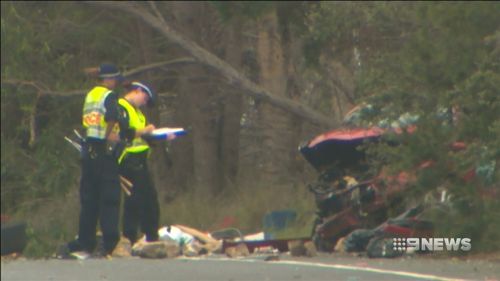 In Grafton, north of Coffs Harbour, another man was killed and five others injured in a two-car collision that saw a wife trapped in a vehicle for up to two hours.