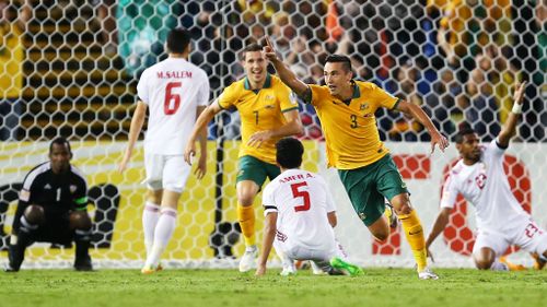 Jason Davidson of Australia celebrates after scoring a goal during the Asian Cup Semi Final. (Getty)