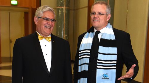 Liberal Member for Hasluck Ken Wyatt and then Treasurer Scott Morrison arrive for the annual Mid Winter Ball at Parliament House in Canberra in 2016.