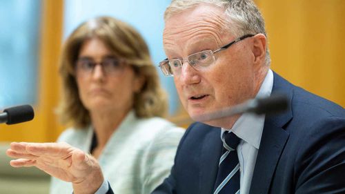 Deputy Governor Michele Bullock and RBA Governor Philip Lowe during a hearing at Parliament House in Canberra.