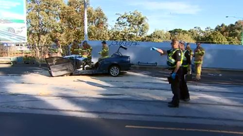 A male driver is in a critical condition after his car collided with a tram. (9NEWS)