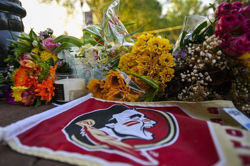 A vigil is held near the Florida State University student centre on , following the shooting.