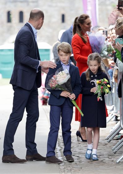 Prince George of Cambridge and Princess Charlotte of Cambridge hold bouquets of flowers during a visit to Cardiff Castle on June 04, 2022 in Cardiff, Wales.  