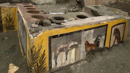 Experts say it is the first time such a hot-food-drink eatery — known as a thermopolium — was completely unearthed. (AP)