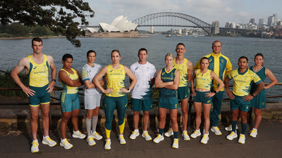 Athletes pose during the Australian 2024 Paris Olympic Games ASICS uniform launch at Yurong Point, Mrs Macquarie's Chair.