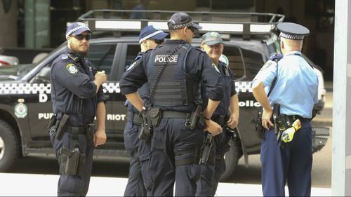 Armed police outside Paramatta District Court ahead of Alou's sentencing. (AAP)