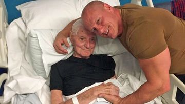 Ashley Tomlinson, pictured with his father Owen, before he passed away. 