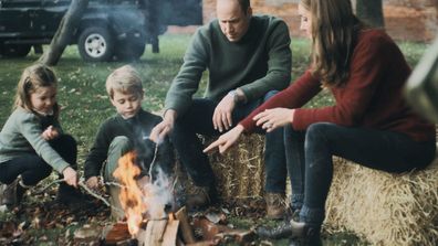 Princess Charlotte, Prince George, Prince William and Kate Middleton roast marshmallows on an open fire