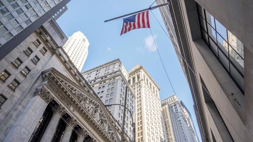  Financial Markets Wall Street showing a USA flag.