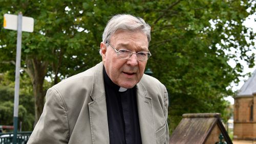 Cardinal George Pell is seen outside St Mary's Cathedral in Sydney on December 15, 2017. (AAP)