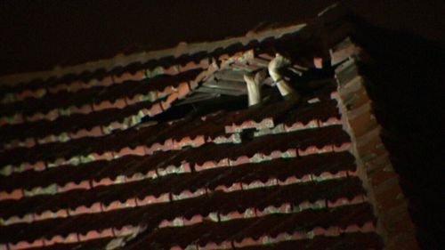 The 21-year-old attempted to hide inside the roof. (9NEWS)