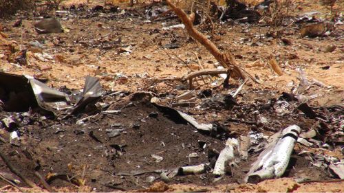 Wreckage at the Mali crash site of flight AH5017.