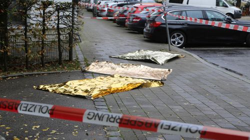 Rescue blankets lying on the ground near Rosenheimer Platz square. (AP)