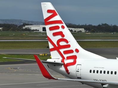 A Boeing 737-800 is seen at the Virgin Australia Airlines terminal at Adelaide Airport in Adelaide.