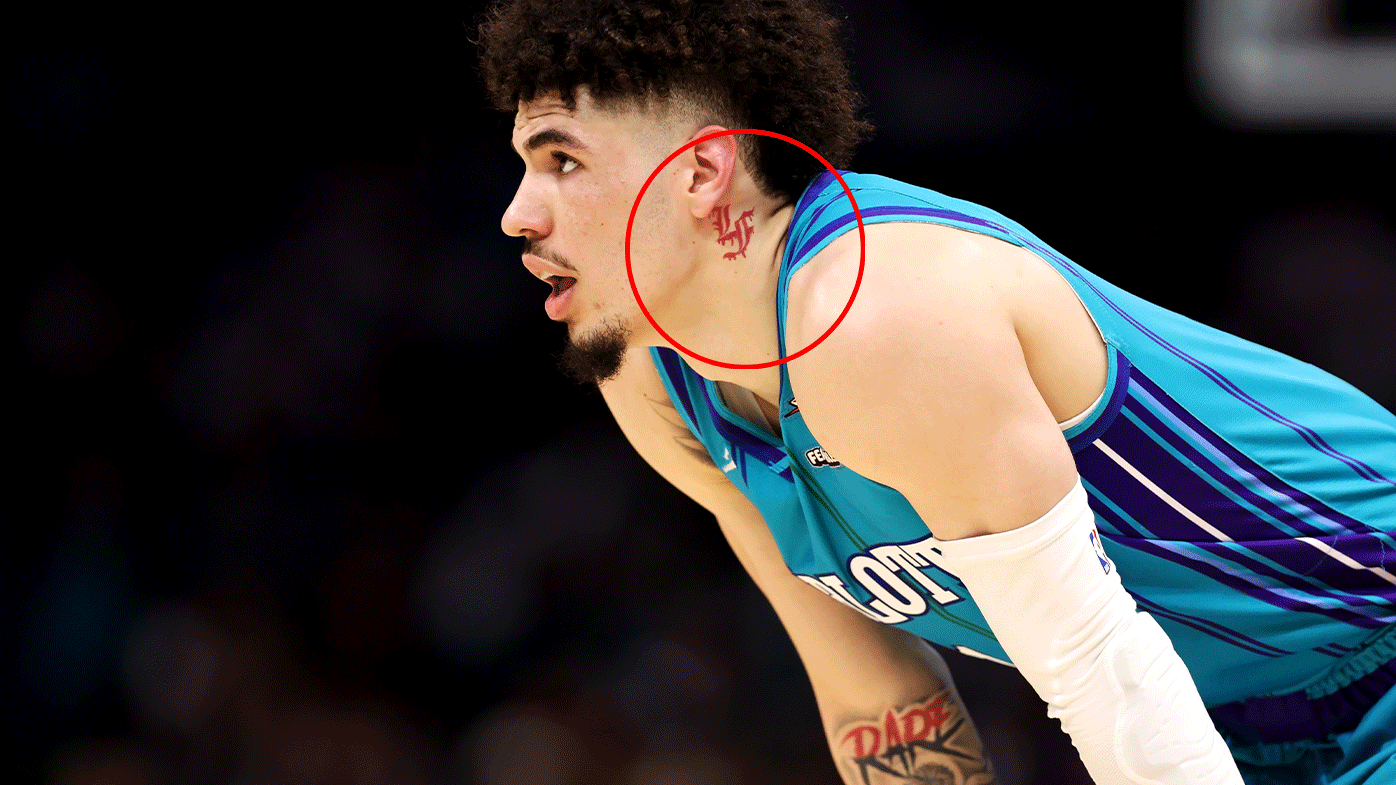 'Violation of the rule': Charlotte star Lamelo Ball forced to cover neck tattoo 