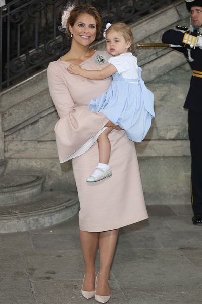 Princess Madeleine of Sweden, wearing Giambattista Valli, and Princess Leonore of Sweden at the christening of Prince Oscar of Sweden in Stockholm, May, 2016