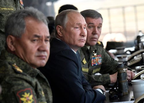 Russian President Vladimir Putin watches military exercises