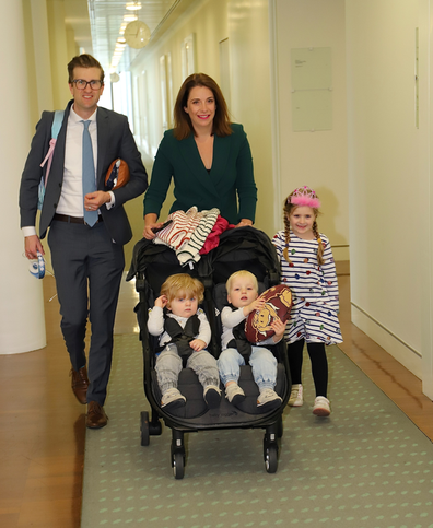 Queensland MP Anika Wells, the new Minister for Aged Care and Sport walking with her family.
