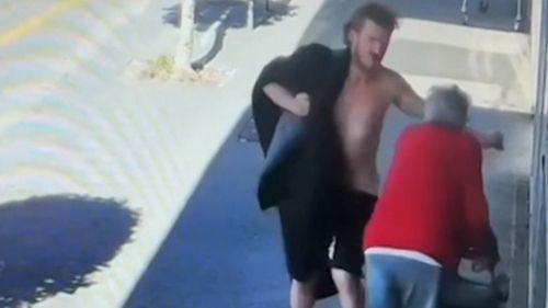 CCTV has captured the moment a shirtless man allegedly knocked an elderly woman unconscious ﻿outside a Melbourne shopping centre. 