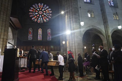 A funeral service gets under way in St. Georges Cathedral in Cape Town, South Africa, Saturday, Jan. 1, 2022  for Anglican Archbishop Desmond Tutu Emeritus. 