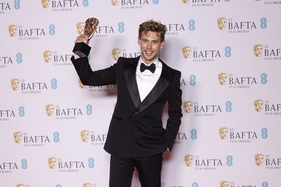Austin Butler, winner of the leading actor award for 'Elvis', poses for photographers at the 76th British Academy Film Awards, BAFTA's, in London, Sunday, Feb. 19, 2023 