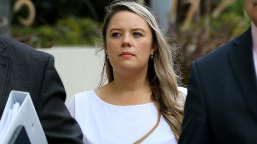 Training and compliance officer Amy Crisp arrives for the inquest. Picture: AAP