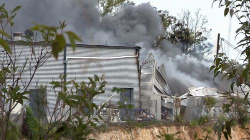 Fire has destroyed a Gold Coast surfboard factory, sending thick black smoke billowing across neighbouring suburbs.
